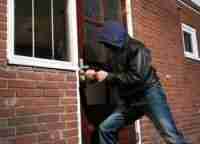 man breaking into home
