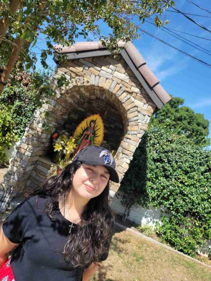 Artist Angel Mia is sporting the brand new St Michael the Archangel hat